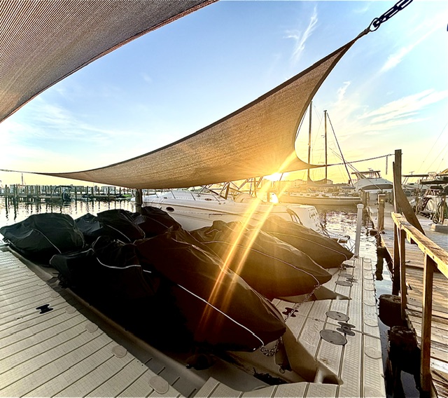 Jet skis ready at sunrise in Barefoot Bay Marina